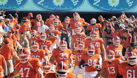 Clemson football players running down the Hill.