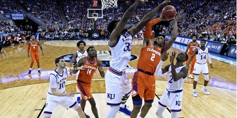 Jayhawks overcome DeVoe's heroics as Clemson's season ends in Sweet 16