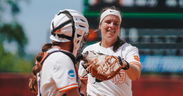 Tigers pour it on after weather delay for run-rule NCAAs win over Spartans