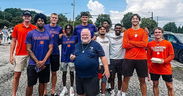Clemson player gives his shoes to homeless man headed to job interview